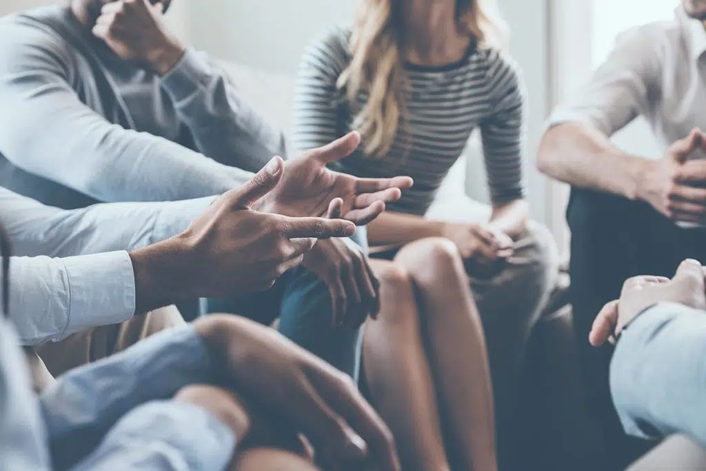 a group gets together to discuss relapse prevention