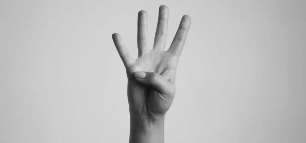 hand with four fingers up