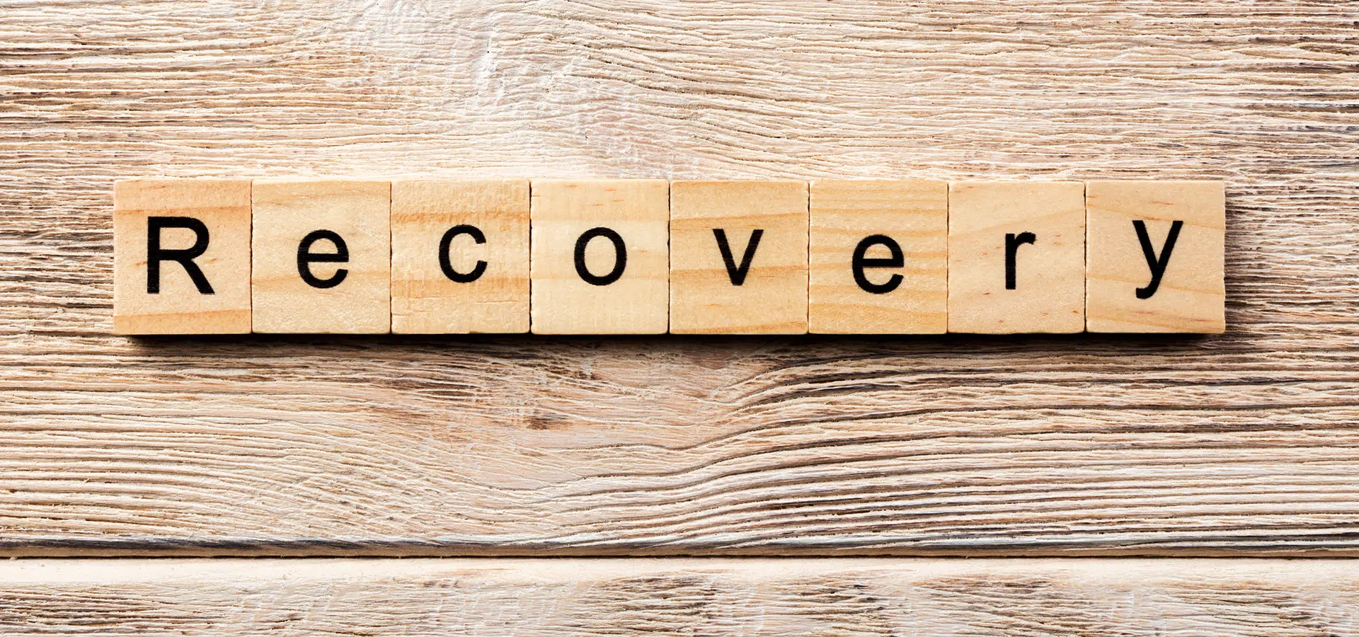 recovery spelled in wood blocks
