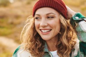 woman smiling after learning About Midwest Recovery Center