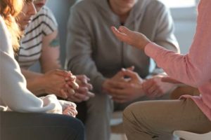 people in meeting about Alcohol Addiction Treatment programs in oh