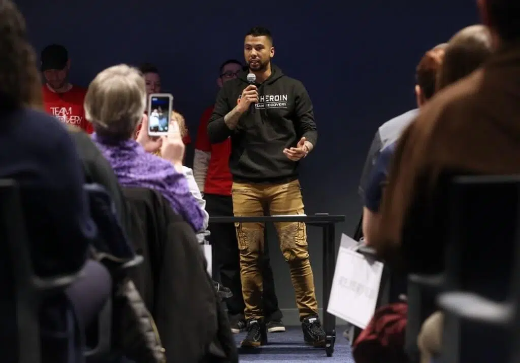 man speaks to a crowd