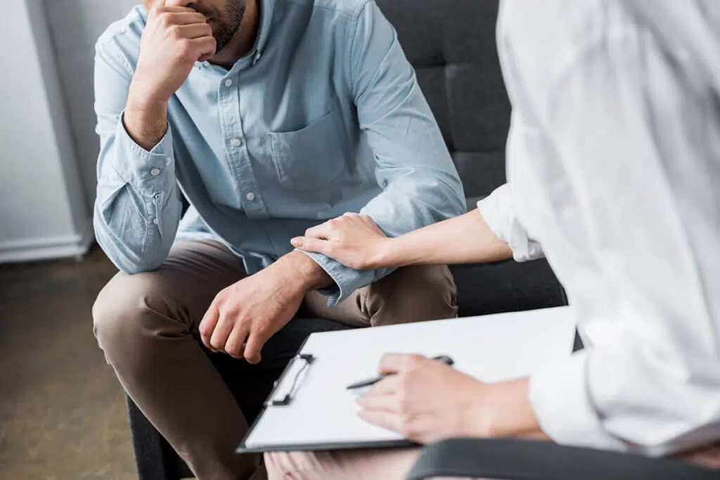woman conducting an intervention for boyfriend after learning How to Help an Alcoholic