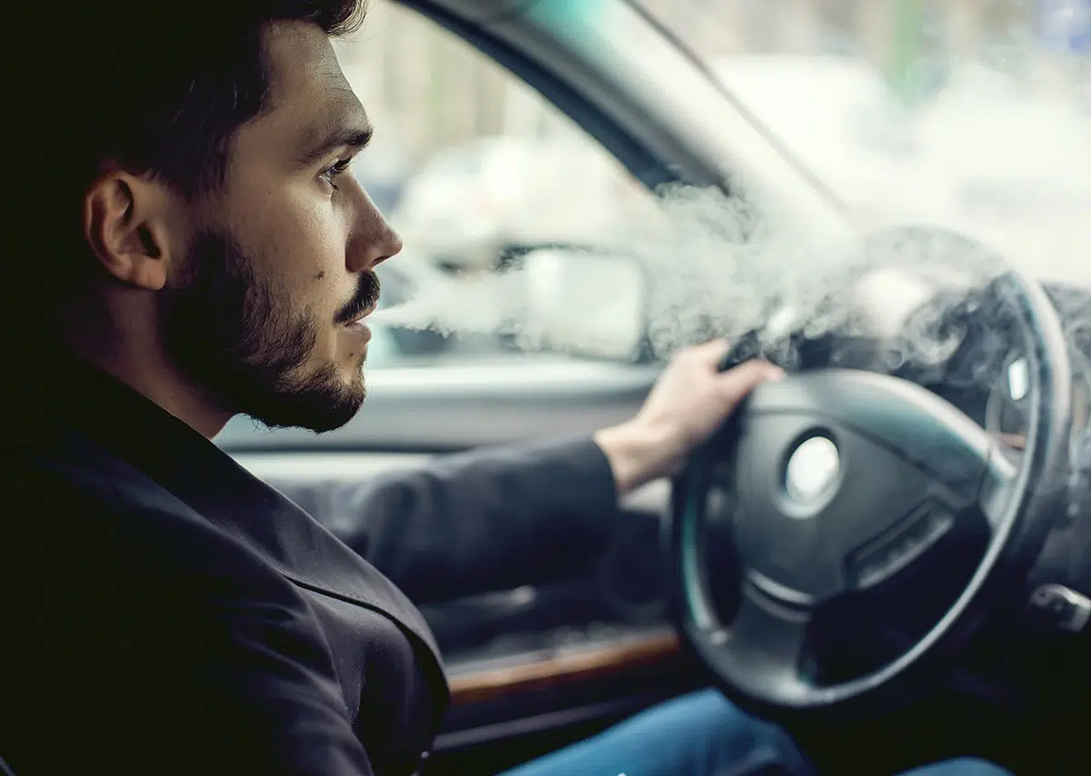man abusing marijuana and driving