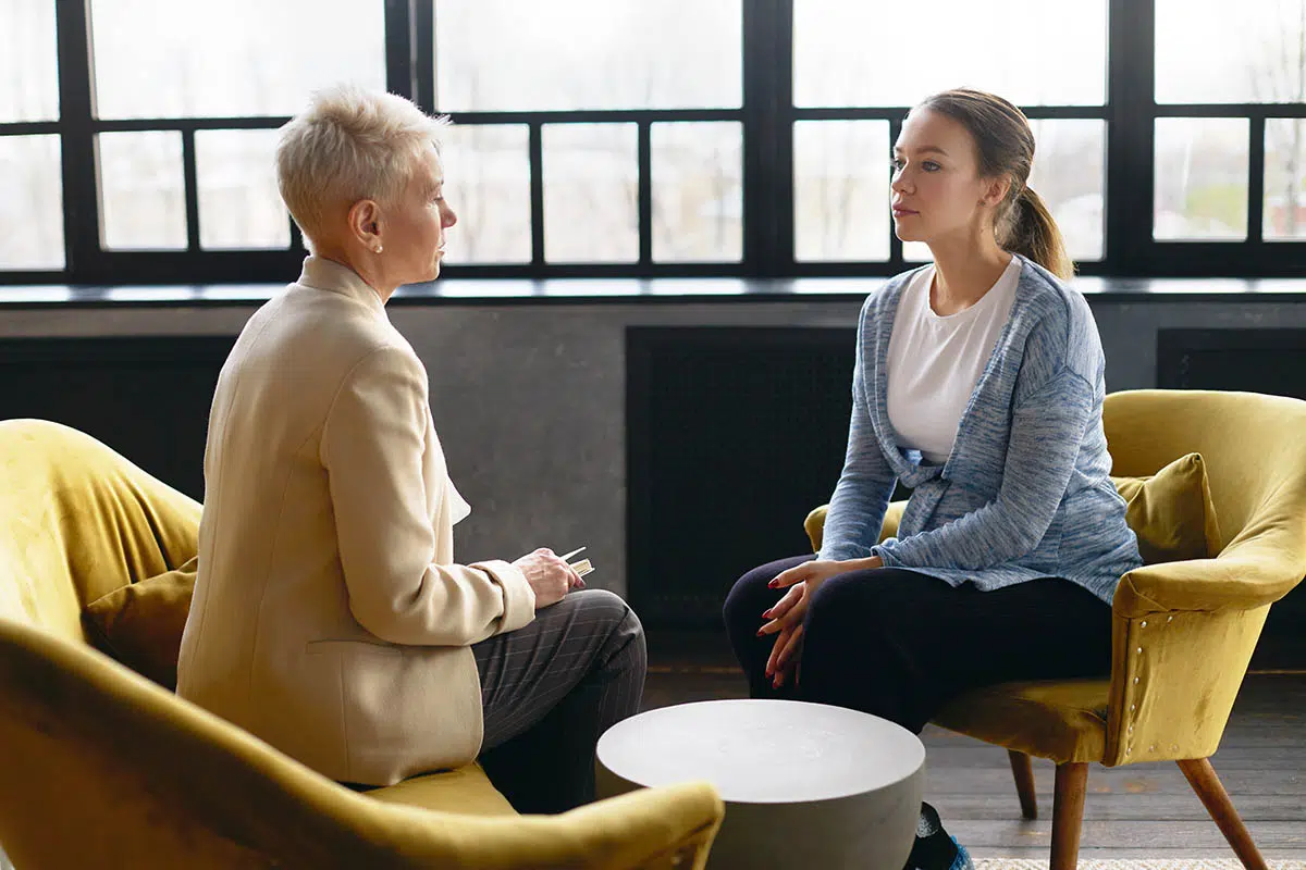 woman learns about what she can do to help fix the stigma around addiction