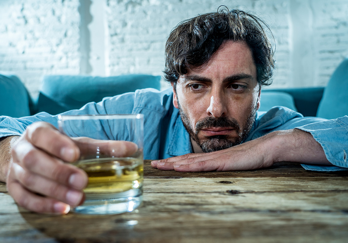 man learns about what can cause his alcoholism