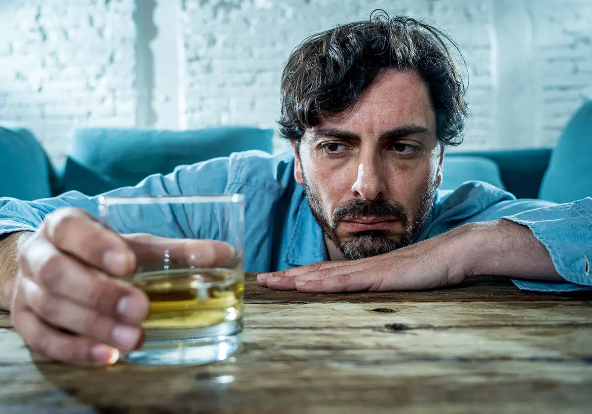 man learns about what can cause his alcoholism