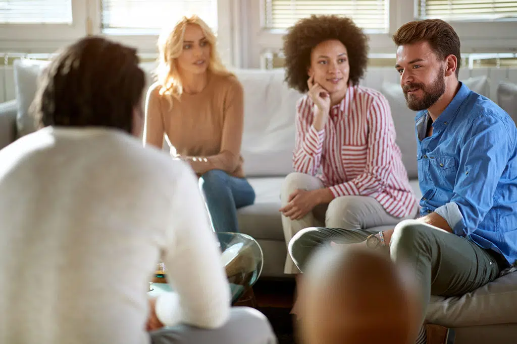 group discusses community housing during recovery