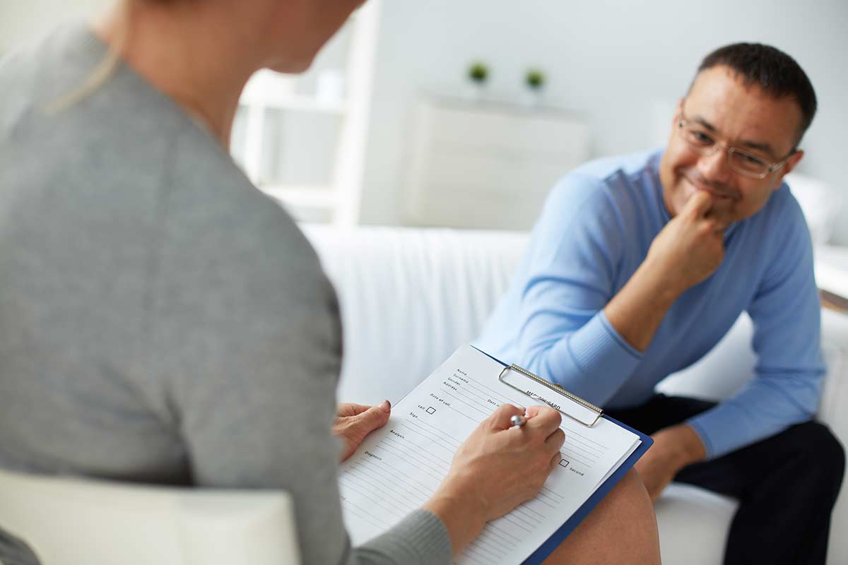 patient in partial hospitalization program with therapist