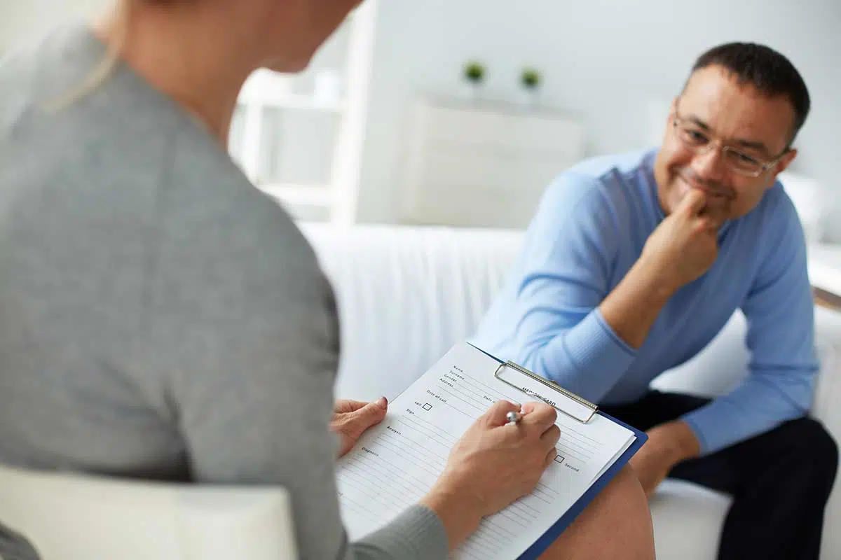 patient in partial hospitalization program with therapist