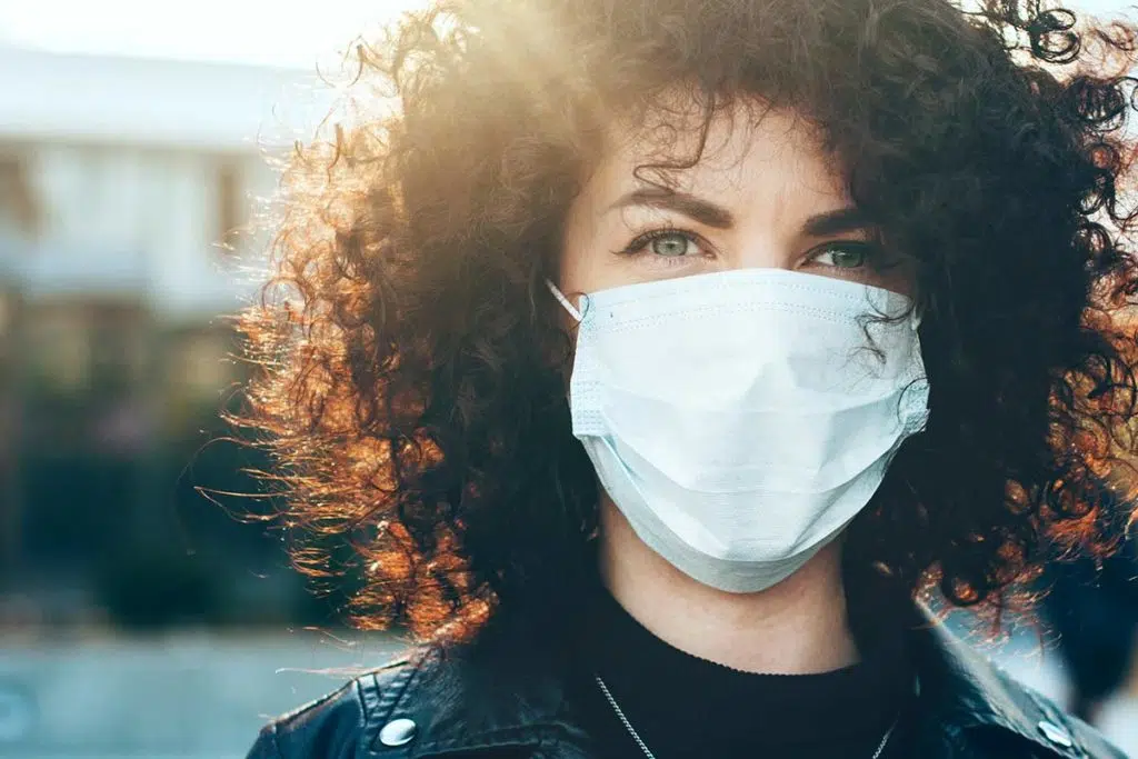 person wearing mask in outpatient treatment during covid