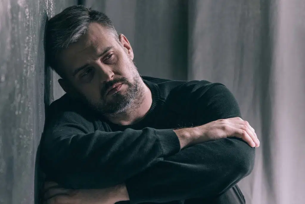man struggles with the long term effects of alcohol addiction